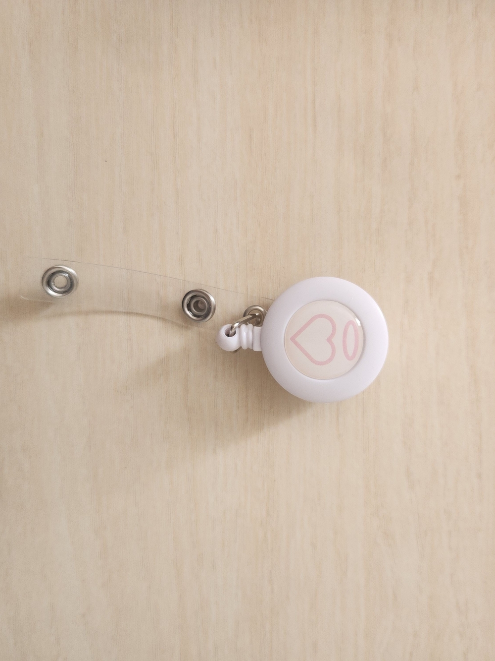 White and Pink Retractable Badge Reel with Heart Design